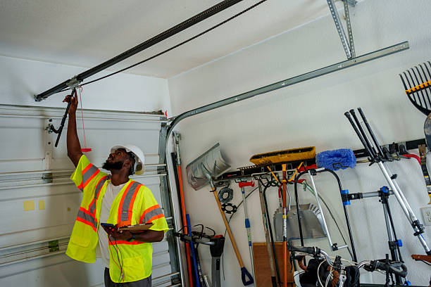 Professional Garage Door Maintenance technician working in Vale, OR